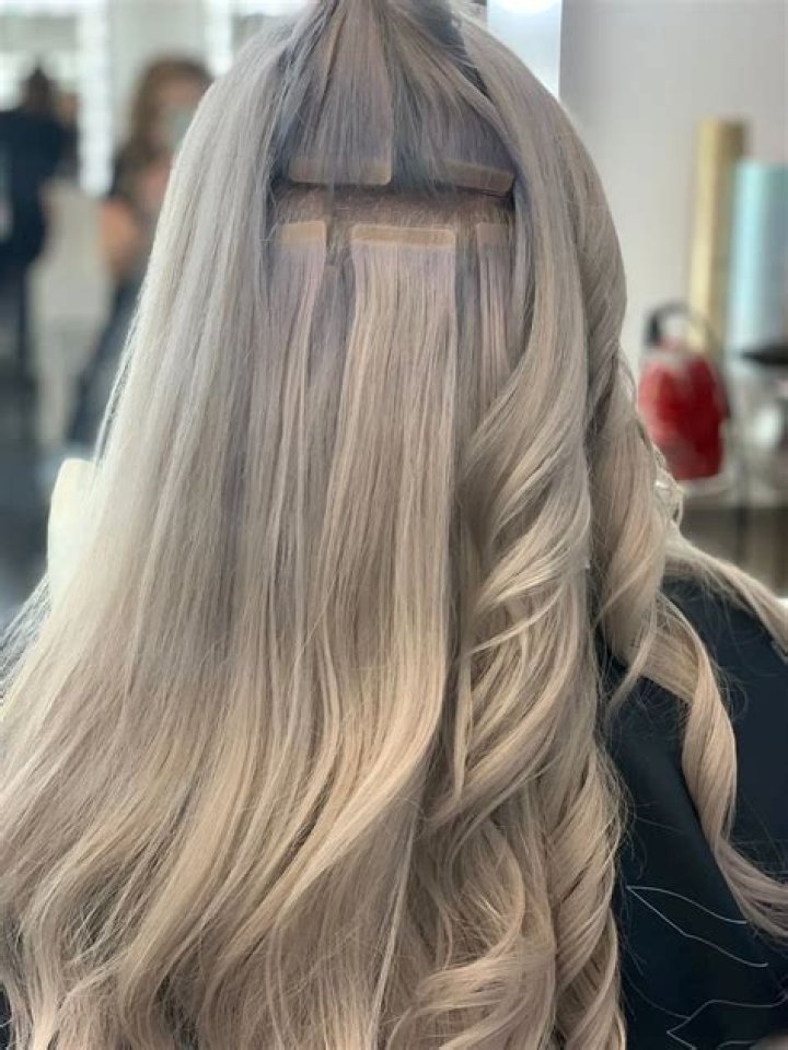 Can I sleep with tape in hair extensions?