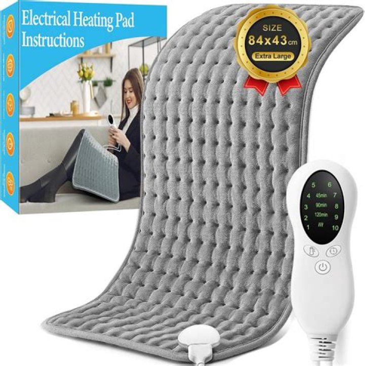 Can you cover a heating pad with a blanket?