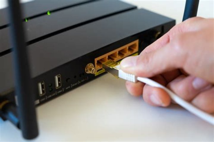 How do I add a second router to my home network?