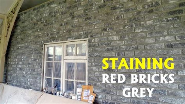How do you paint over painted brick?