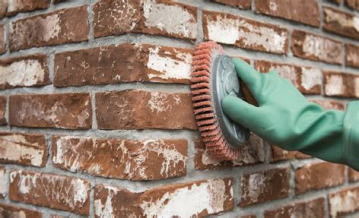 How do you remove old paint from a brick fireplace?