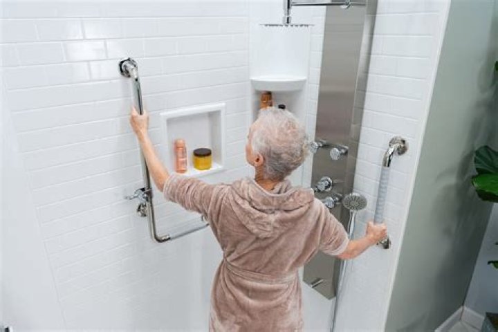 How long should hot water last in a shower with a 40-gallon tank?